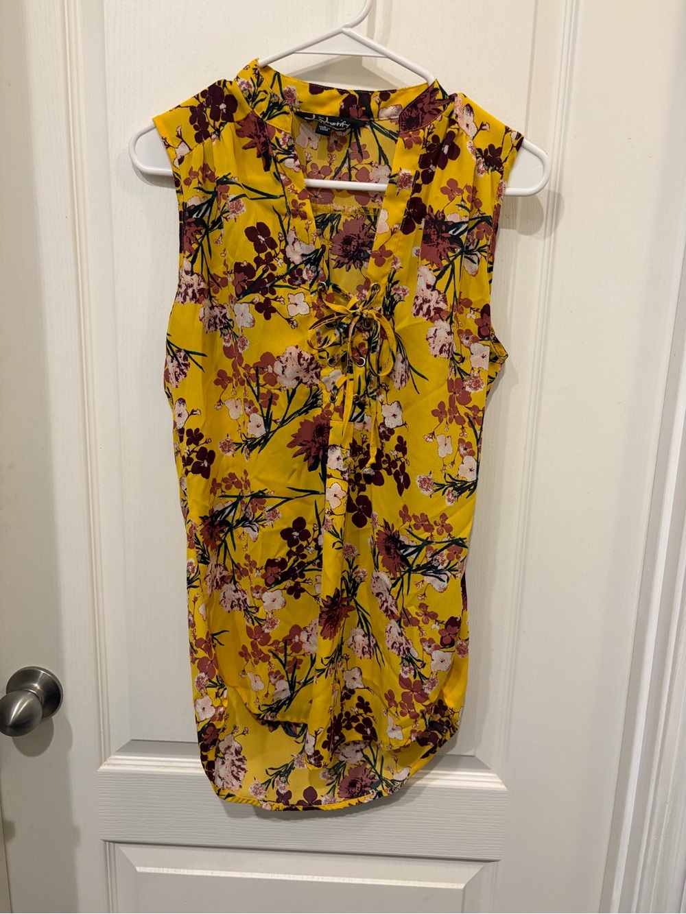 Justify Yellow Sleeveless Floral Tie-Neck Blouse